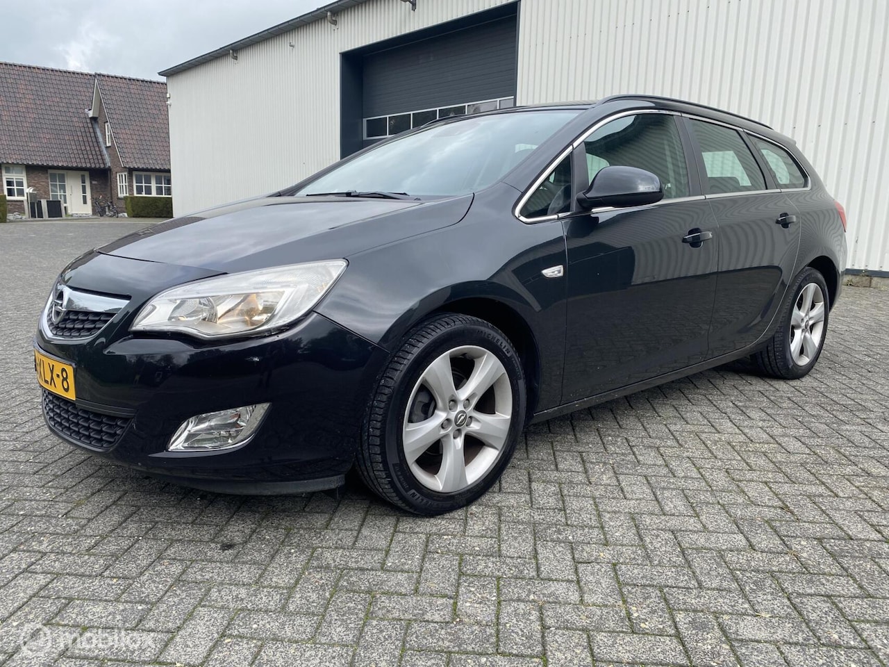 Opel Astra Sports Tourer - 1.4 Turbo Business 1.4 Turbo Business + - AutoWereld.nl