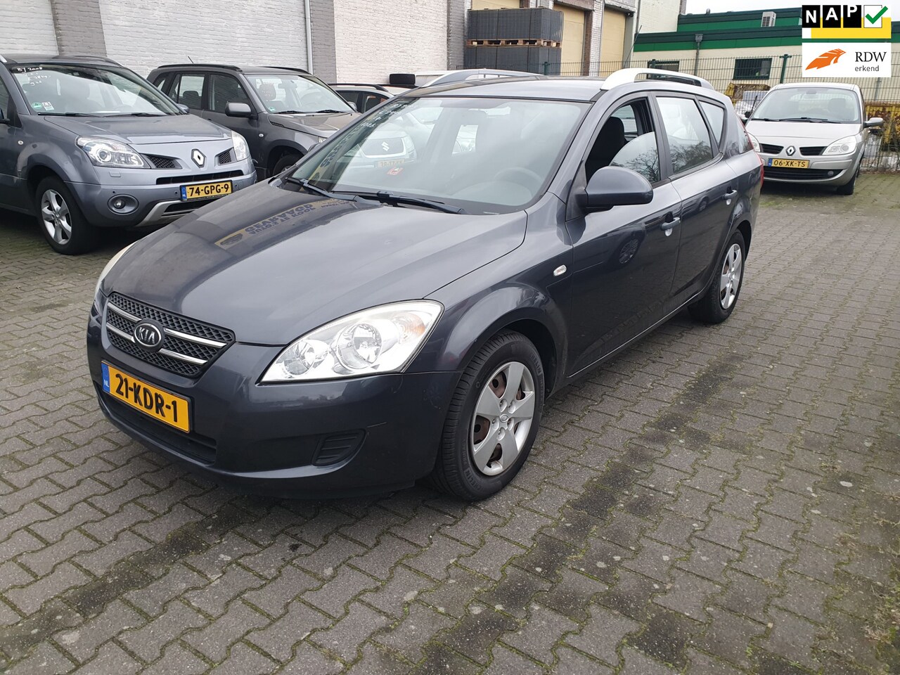 Kia Cee'd Sporty Wagon - Kia Cee'd Sporty Wagon 1.4 CVVT X-tra-5DRS-AIRCO-NAVIGATIE - AutoWereld.nl