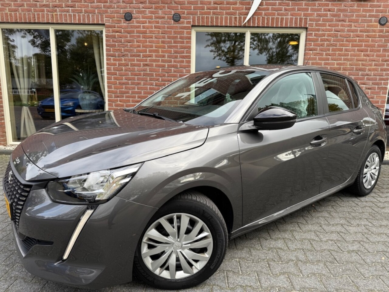 Peugeot 208 - 1.2 PureTech Active RIJKLAAR INCL. GARANTIE / LED / NAVI / AIRCO - AutoWereld.nl