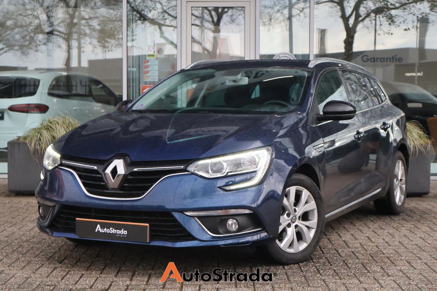 Renault Mégane Estate - 1.3 TCe Limited 115pk | Trekhaak | LED | Navigatie | Cruise | Virtual | Climate | Keyless - AutoWereld.nl