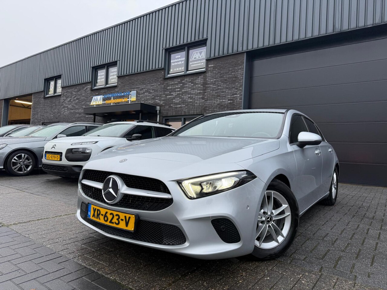 Mercedes-Benz A-klasse - 180 Business Solution | 12MND GARANTIE | NAVIGATIE | CRUISE |LED | DAB | PDC | LMV | GOED - AutoWereld.nl