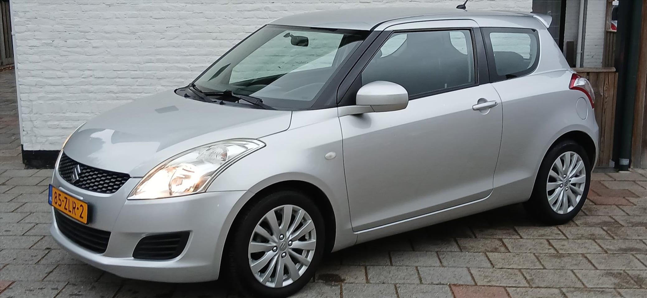 Suzuki Swift - 1.2 3drs banditt cruise/airco/lmv 16 inch top staat - AutoWereld.nl