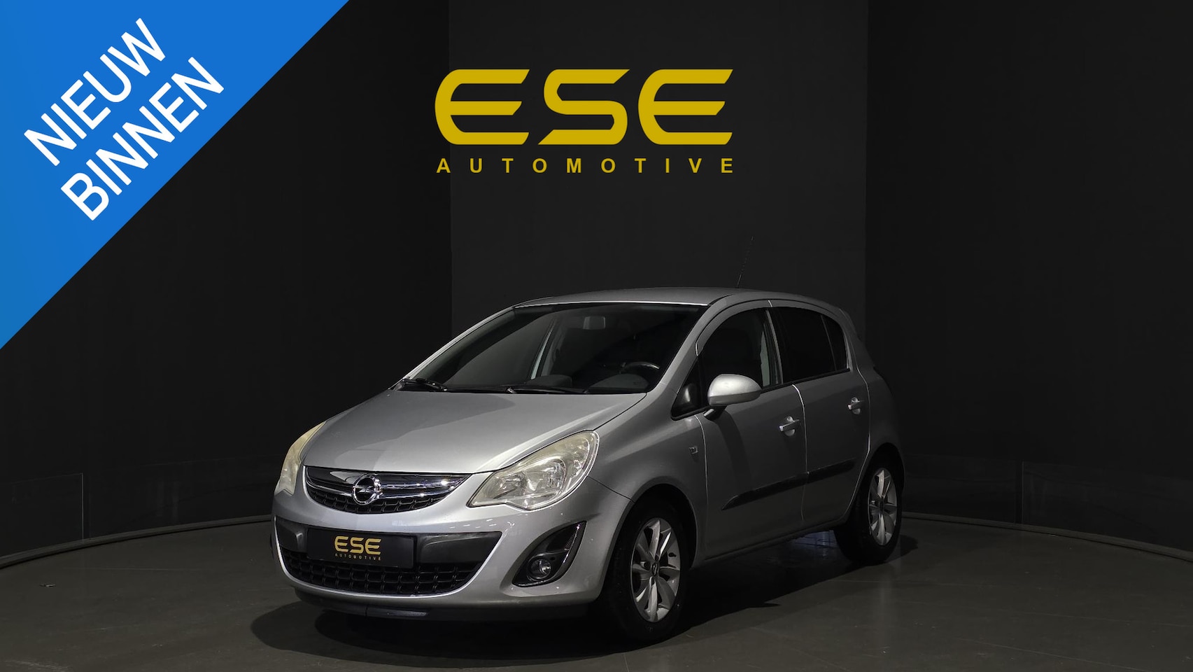 Opel Corsa - 1.4-16V Design Edition | Climate | Cruise | Trekhaak - AutoWereld.nl