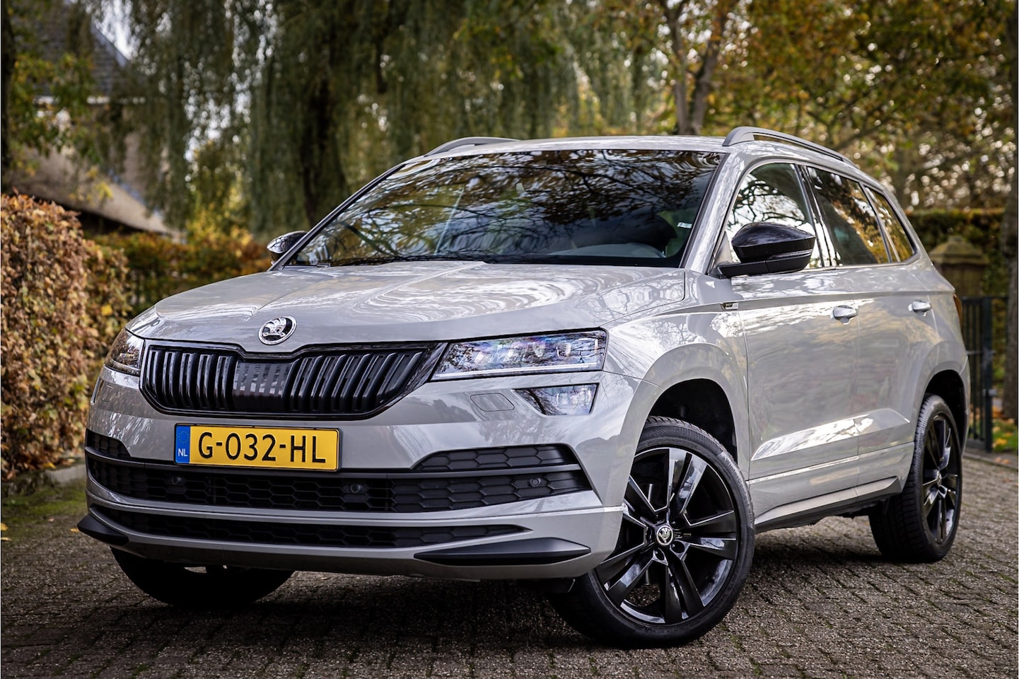 Skoda Karoq - 1.5 TSI ACT Sportline Business Panorama Canton ACC Camera - AutoWereld.nl
