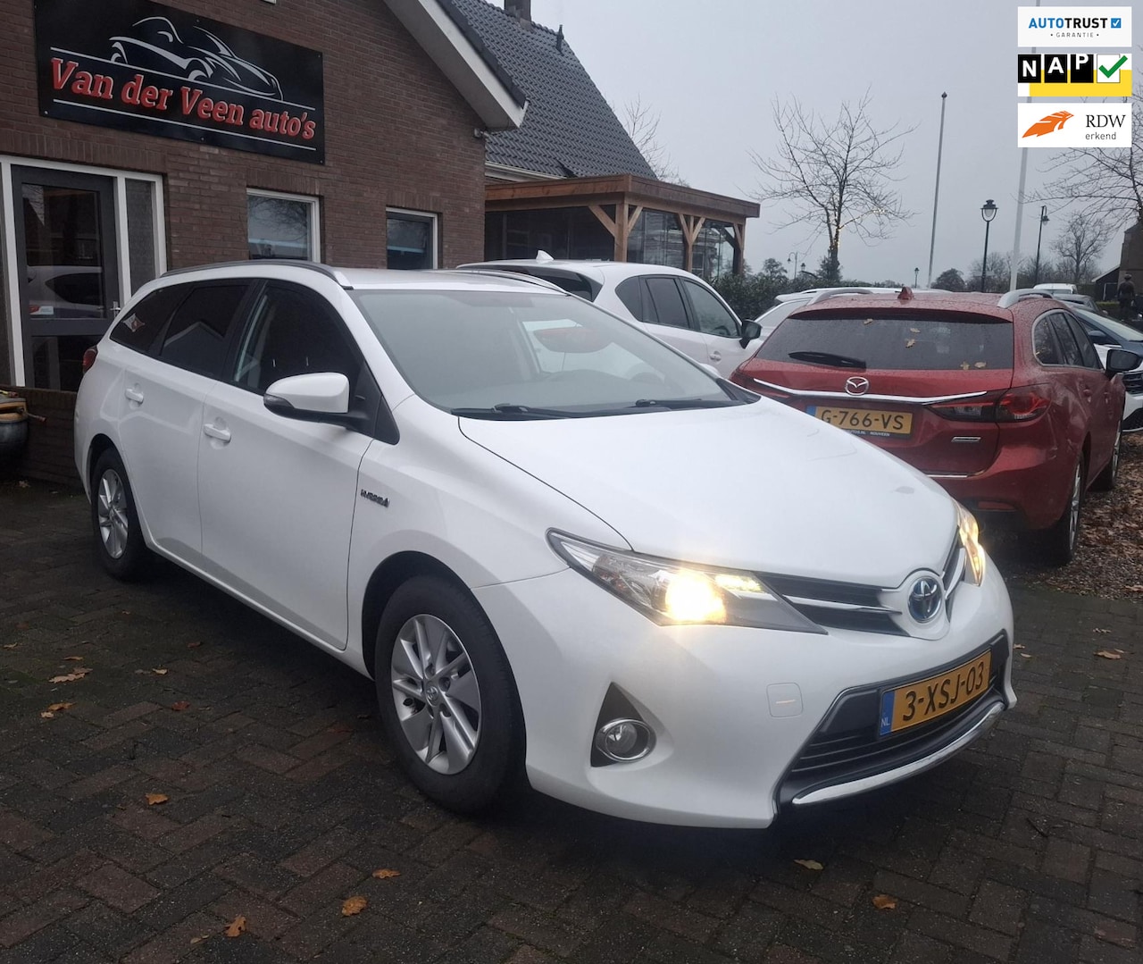 Toyota Auris Touring Sports - 1.8 Hybrid Aspiration. 2de eigenaar, historie aanwezig. Nwe APK + beurt. O.a. camera, blue - AutoWereld.nl