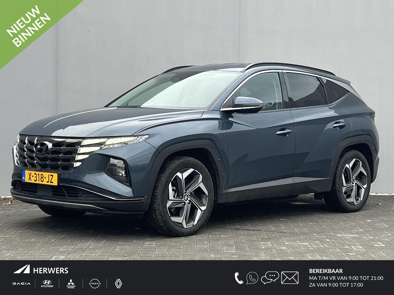 Hyundai Tucson - 1.6 T-GDI PHEV Comfort Smart 4WD / Vaste Trekhaak 13-polig (Trekgewicht 1.350kg) / Achteru - AutoWereld.nl
