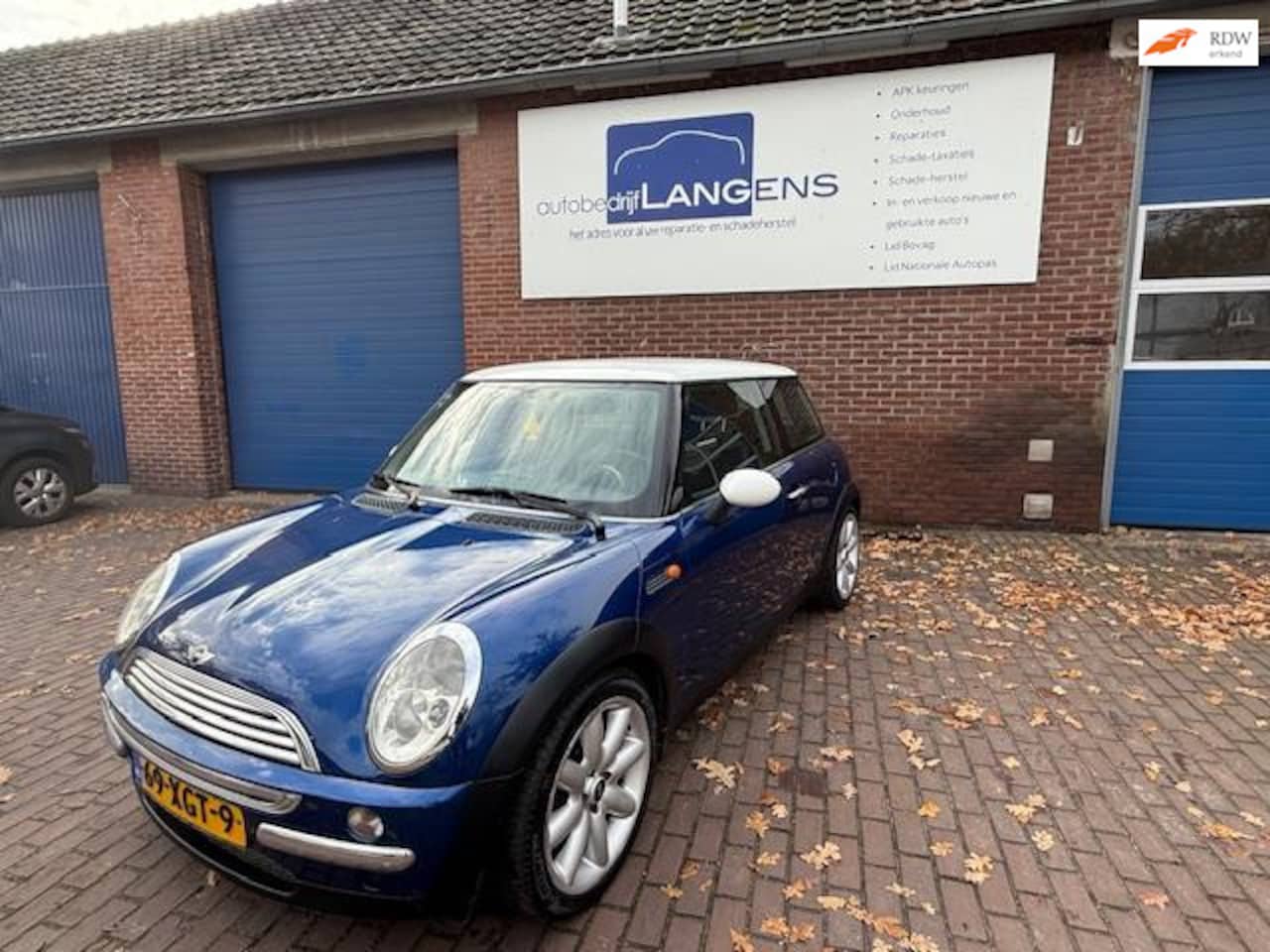 MINI Cooper - 1.6 Pepper Airco , Half leder, Wit dak + spiegels - AutoWereld.nl