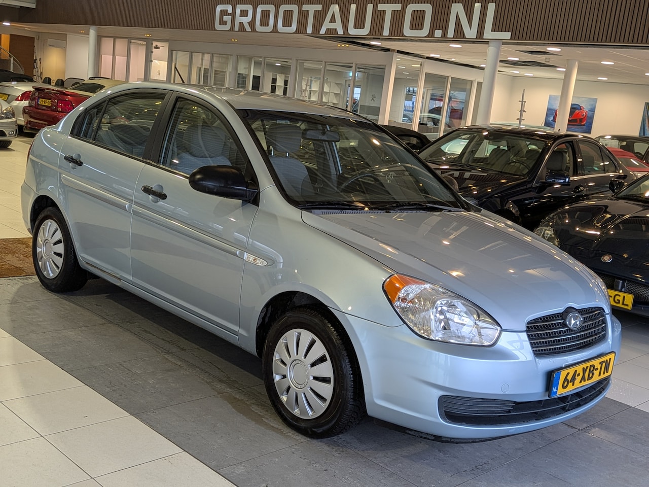 Hyundai Accent - 1.6i Dynamic Airco, Stuurbekrachtiging, Trekhaak - AutoWereld.nl