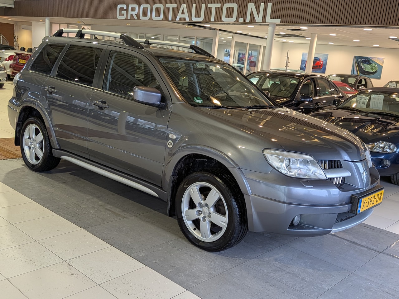 Mitsubishi Outlander - 2.4 Automaat Airco, Cruise Control, Trekhaak, Stuurbekrachtiging - AutoWereld.nl