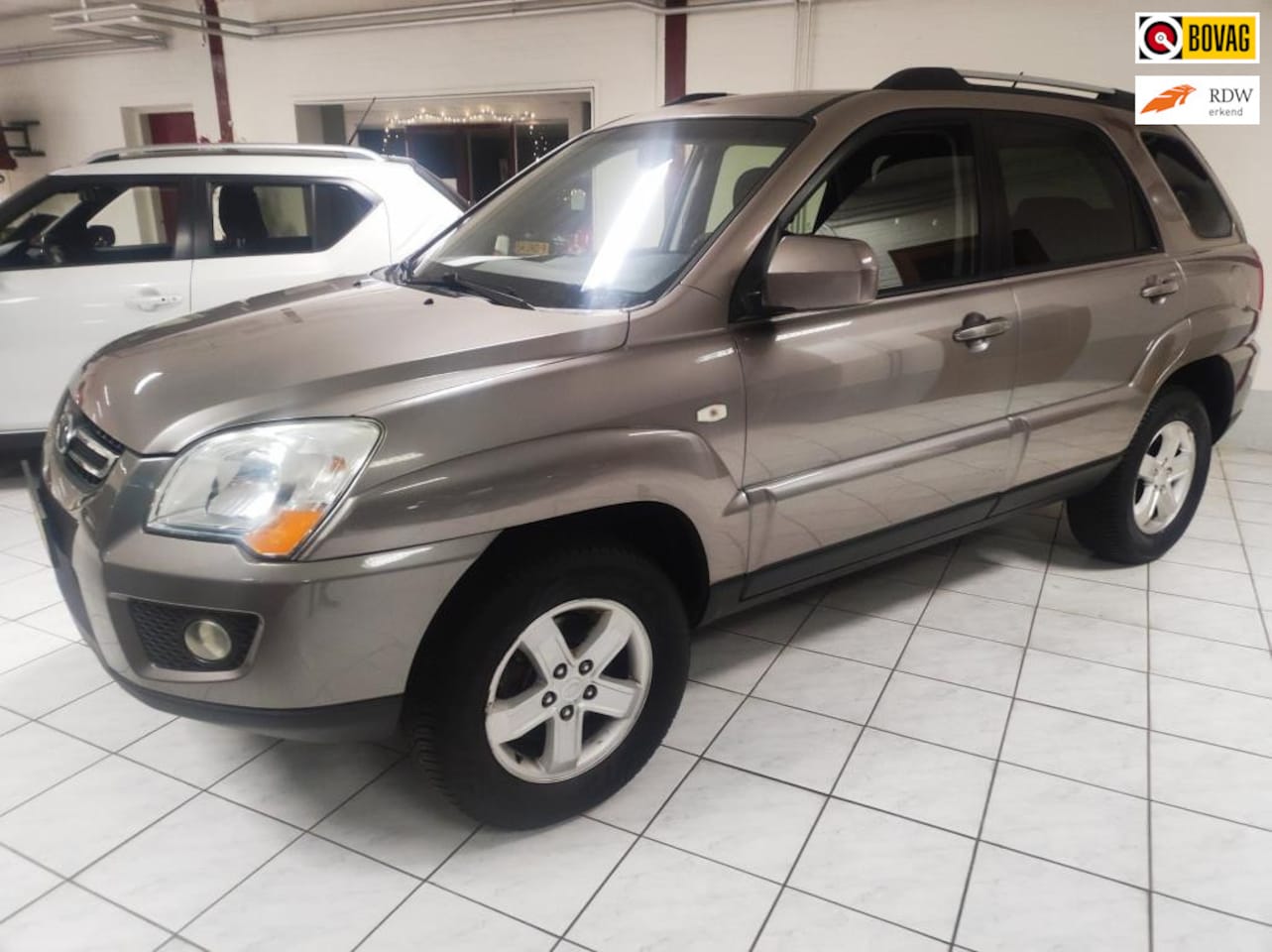 Kia Sportage - 2.0 CVVT X-tra 2.0 CVVT X-tra - AutoWereld.nl