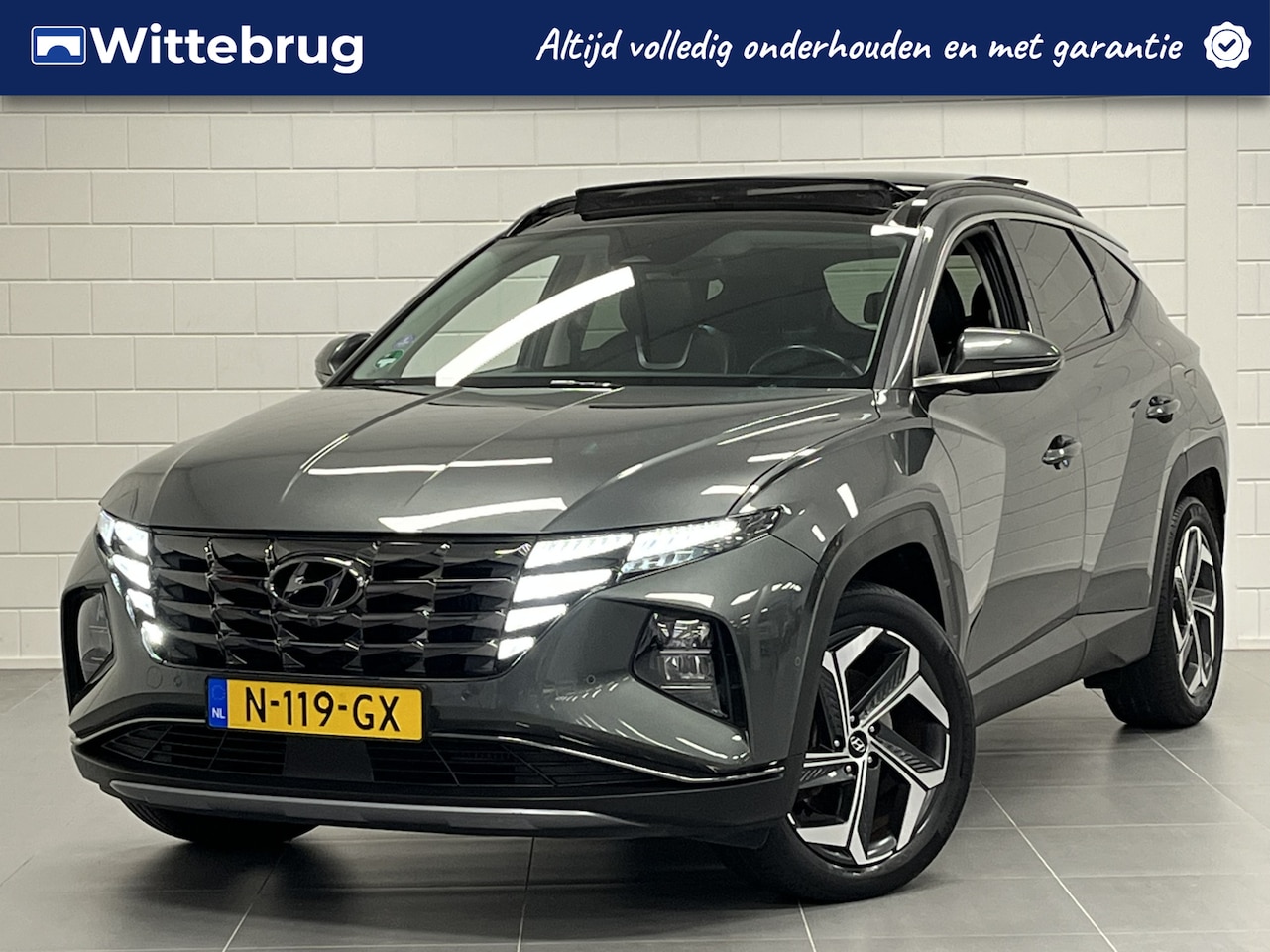 Hyundai Tucson - 1.6 T-GDI HEV Premium Sky TREKHAAK 1650 KG TREKGEWICHT! | PANORAMADAK | LEDER | BOMVOL OPT - AutoWereld.nl