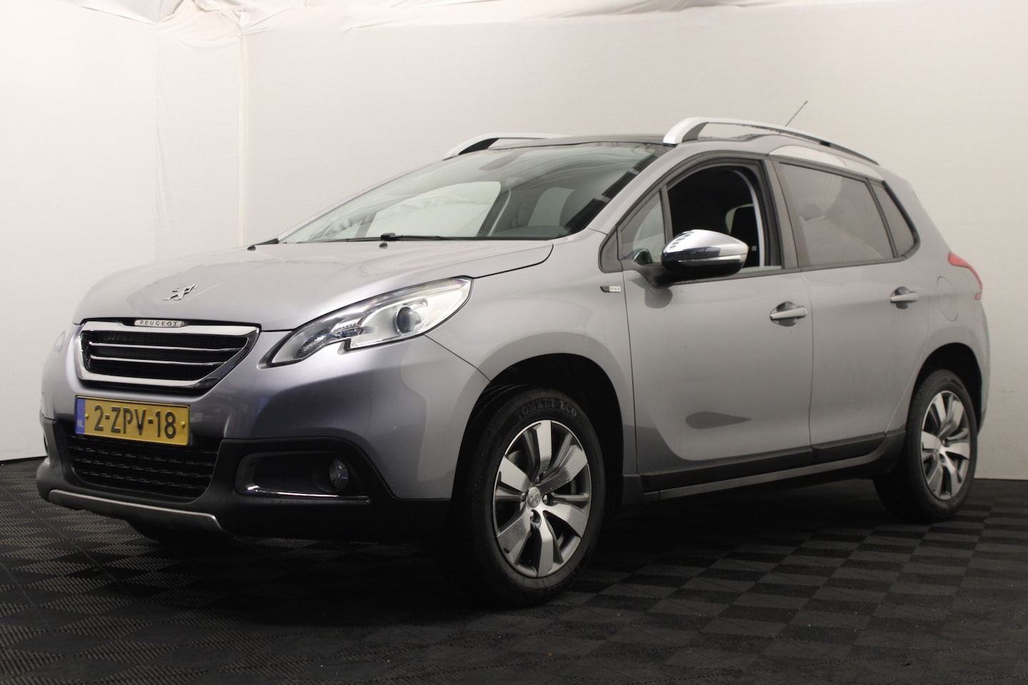 Peugeot 2008 - 1.2 PureTech Style |Pano|Navi| - AutoWereld.nl