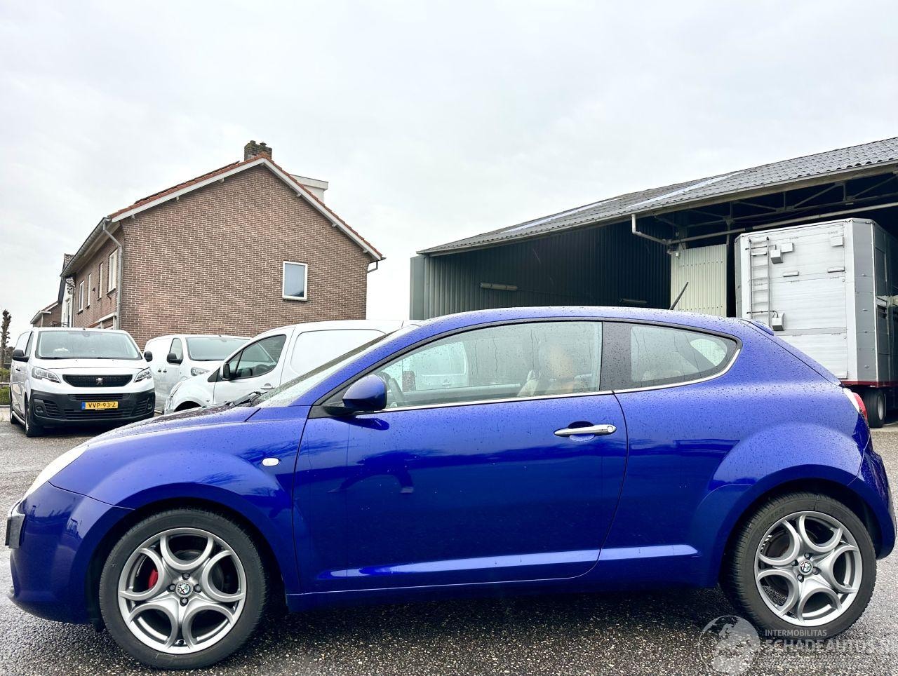 Alfa Romeo MiTo - 0.9 TwinAir Turbo Distinctive - 55dkm nap - leer - navi - pdc - lmv - clima - cruise - car - AutoWereld.nl