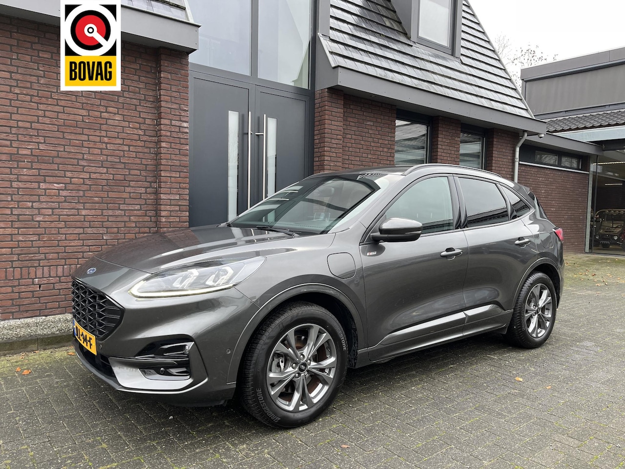 Ford Kuga - 2.5 PHEV ST-Line X NAV | TREKHAAK AFN. | B&O SPEAKERS | LEDER/STOF | LED | ELEC. A.KLEP | - AutoWereld.nl