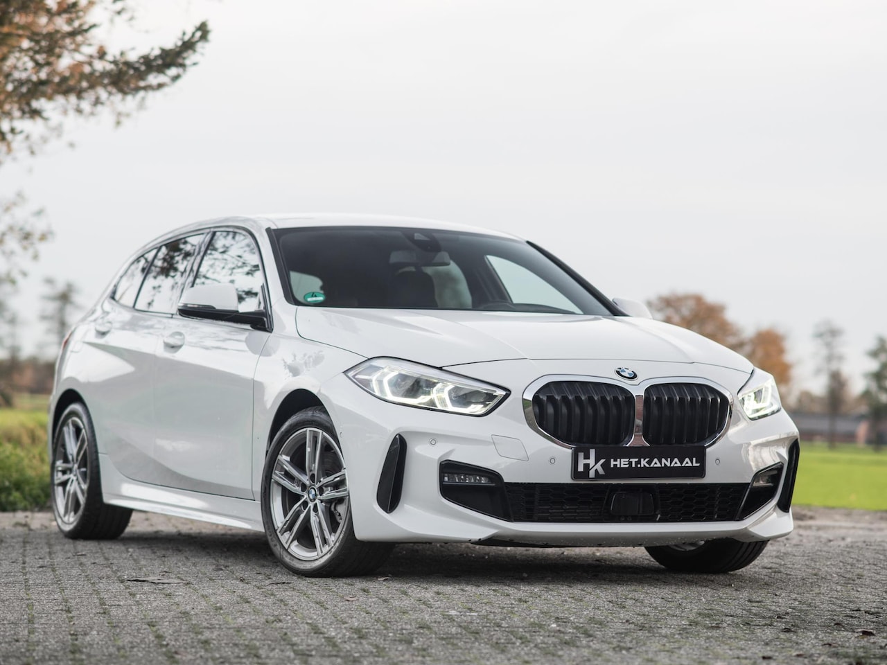 BMW 1-serie - 118i High Executive M-Pakket Stoelv Cam Cruise - AutoWereld.nl