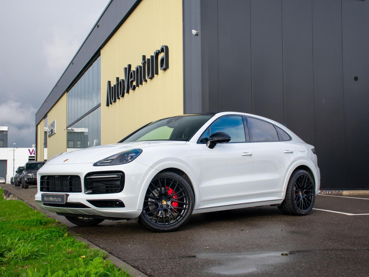 Porsche Cayenne Coupé - 3.0 E-Hybrid | Luchtvering | Sport seats | BOSE Surround | 360 Camera | 22 inch - AutoWereld.nl