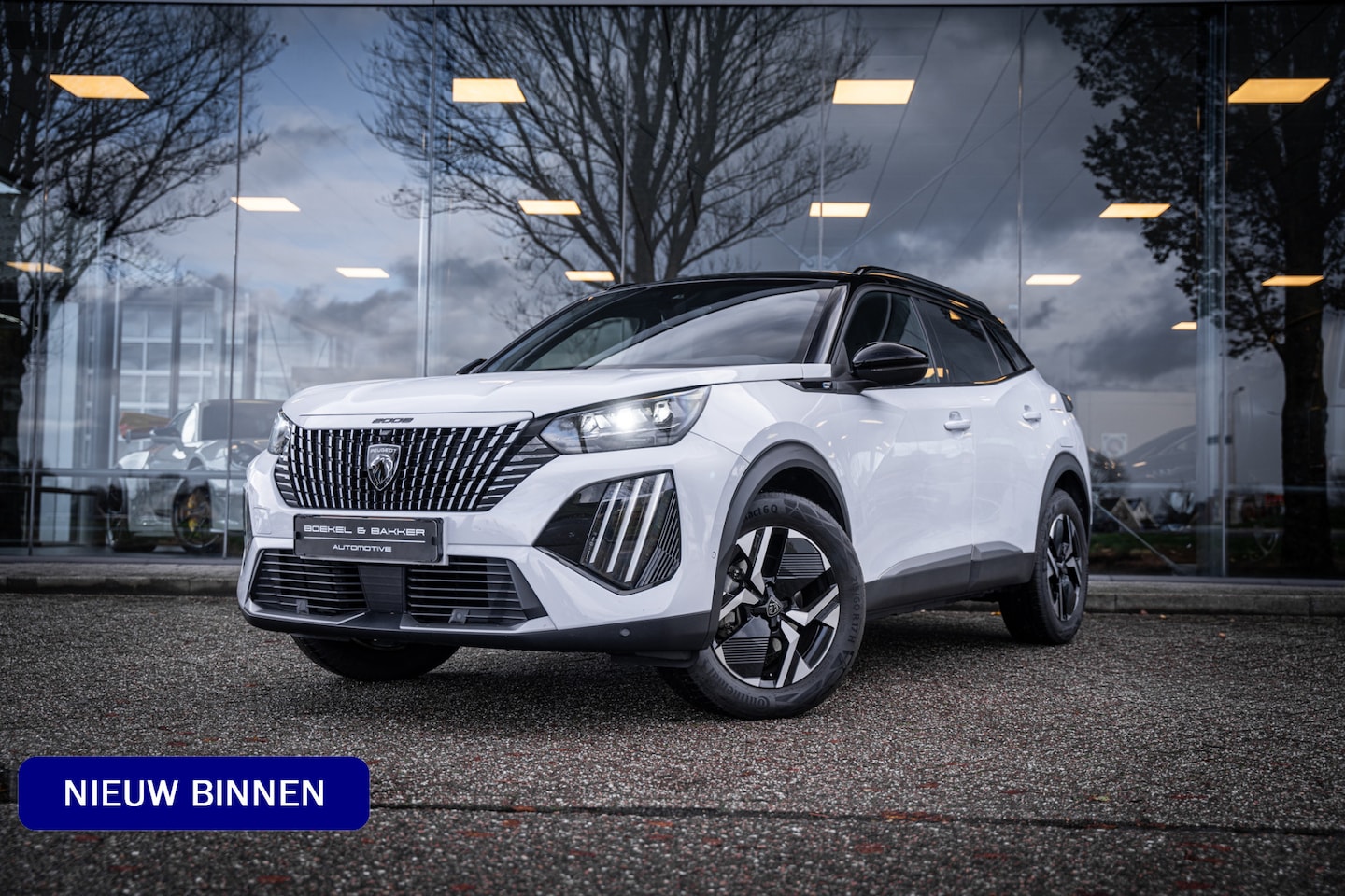 Peugeot e-2008 - EV GT 54 kWh ** Camera ** Navigatie ** Rijbereik tot 568km (WLTP) - AutoWereld.nl