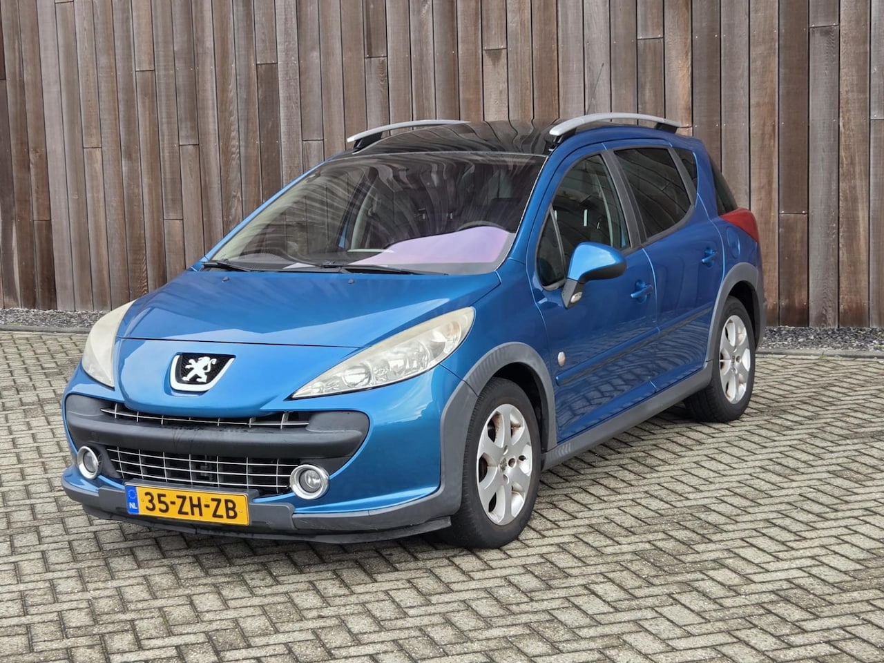 Peugeot 207 SW Outdoor - 1.6 VTi XS Airco - AutoWereld.nl