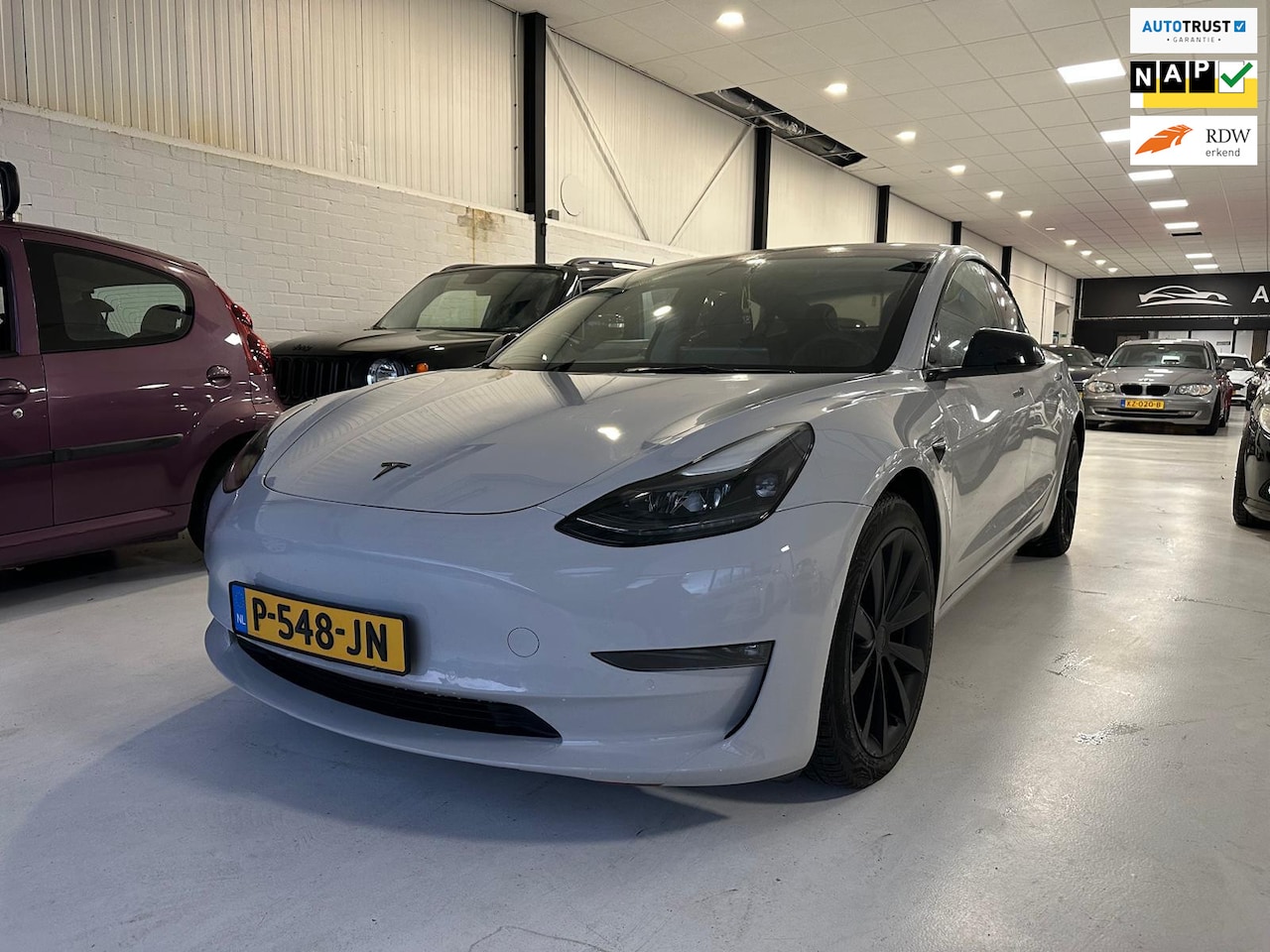 Tesla Model 3 - Long Range RWD Long Range AWD 75 kWh/160088 KM NAP/GEWRAPT - AutoWereld.nl