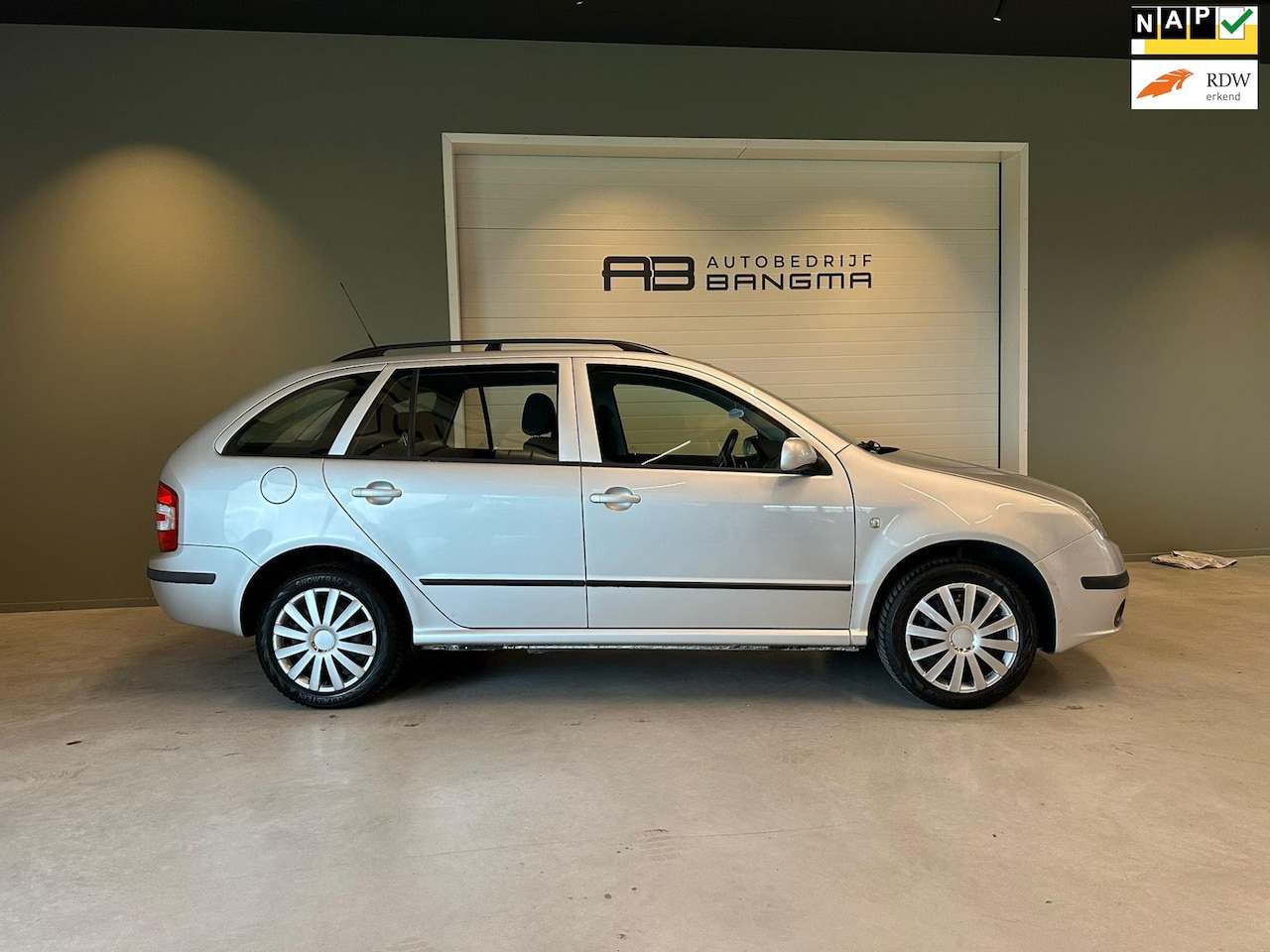 Skoda Fabia Combi - 1.4-16V Spirit+/AIRCO/CRUISE CONTROL/BLUETOOTH/DAKRAILS/TREKHAAK/AUX/NAP/nwe APK+ONDERHOUD - AutoWereld.nl