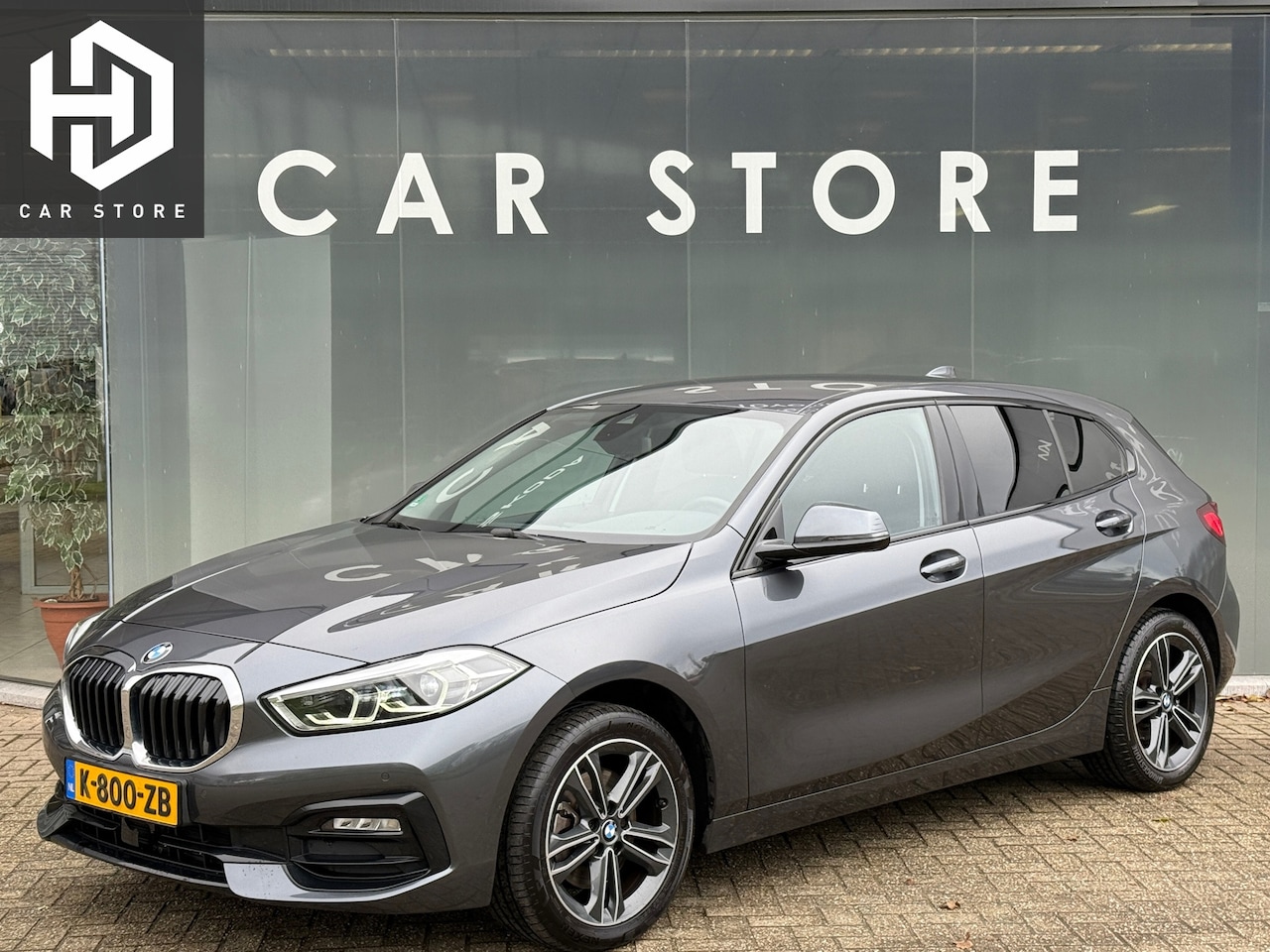 BMW 1-serie - 118i Sport Line Sportstoelen|Leder|Stoelverwarming|Dealer Onderhouden - AutoWereld.nl