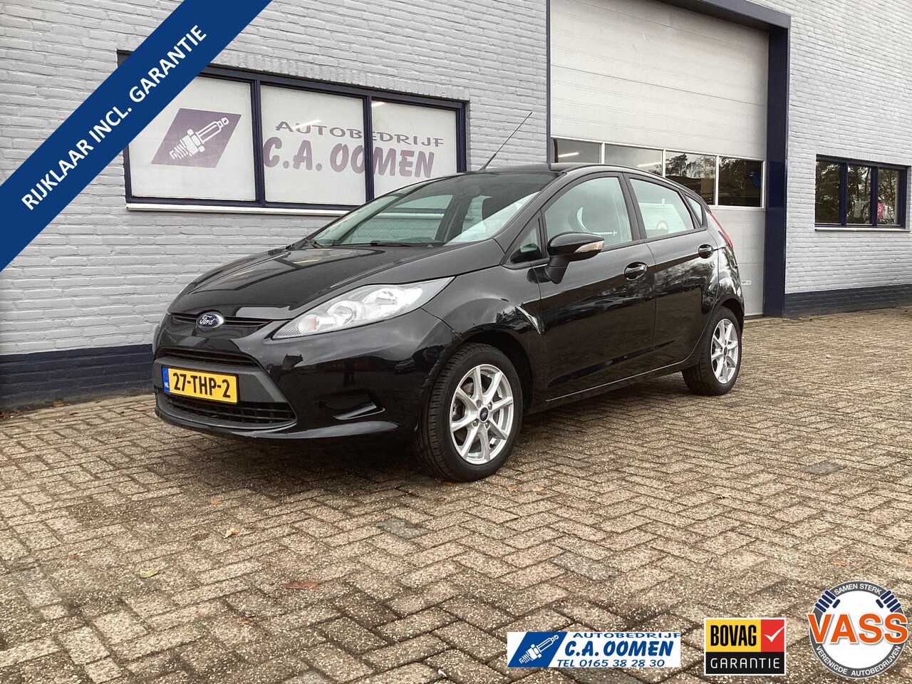 Ford Fiesta - 1.25 Ghia Airco lage kilometerstand met garantie - AutoWereld.nl