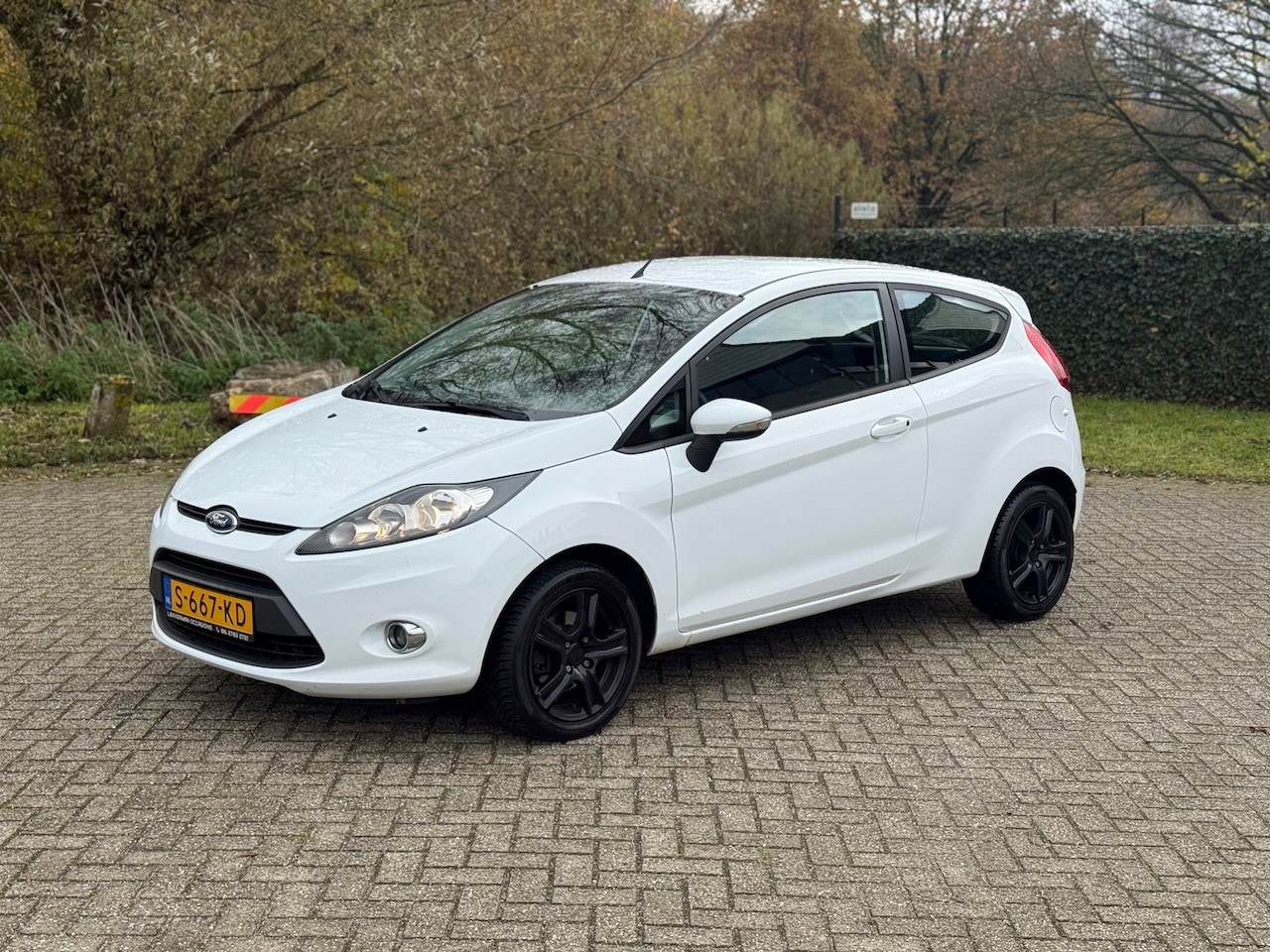 Ford Fiesta - 1.25 Champions AIRCO I VOORUIT VERW I STOELVER I NETTE AUTO - AutoWereld.nl