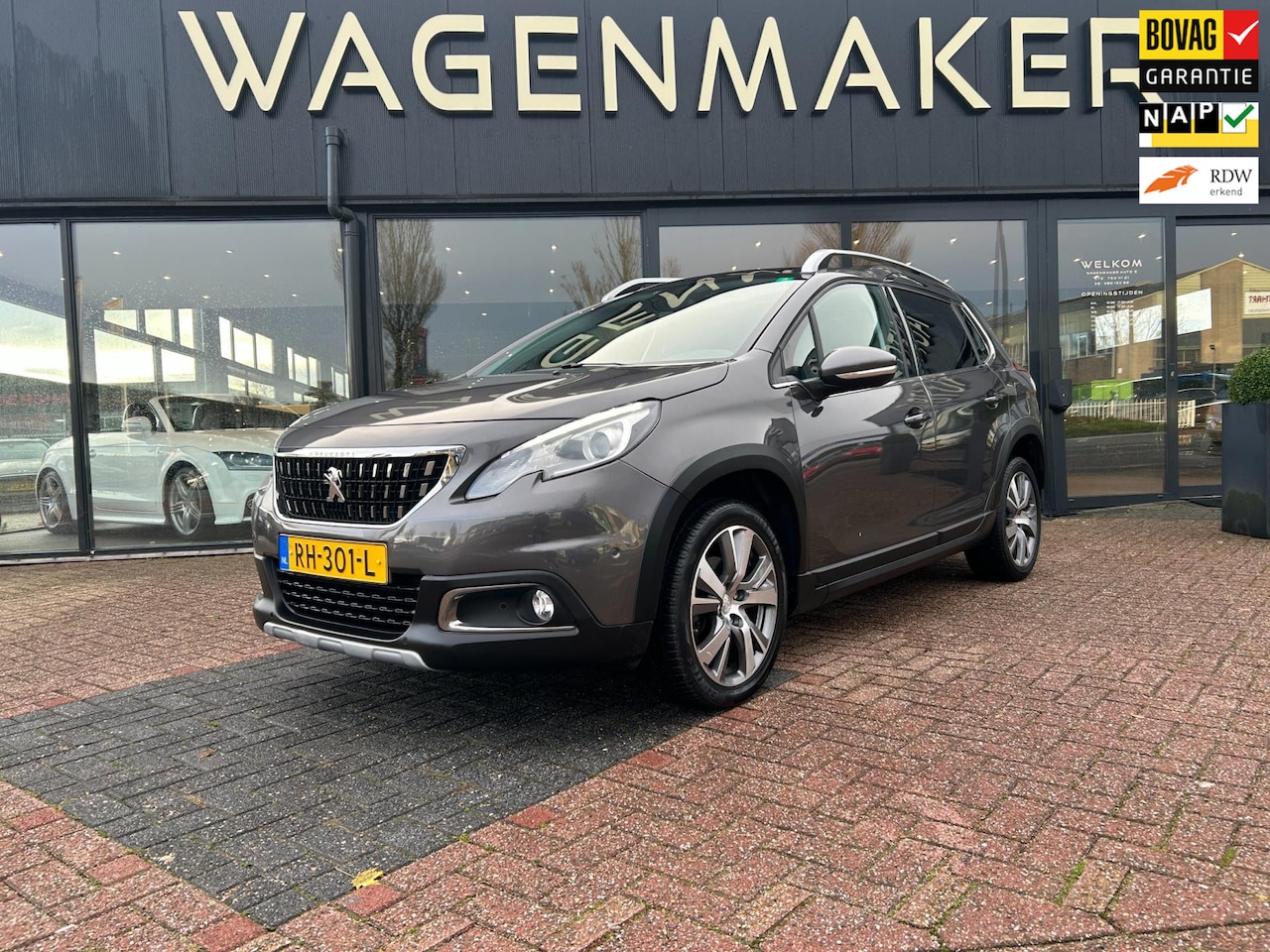 Peugeot 2008 - 1.2 PureTech Allure NAVI|CAM|PANO|Carplay|DealerOH - AutoWereld.nl