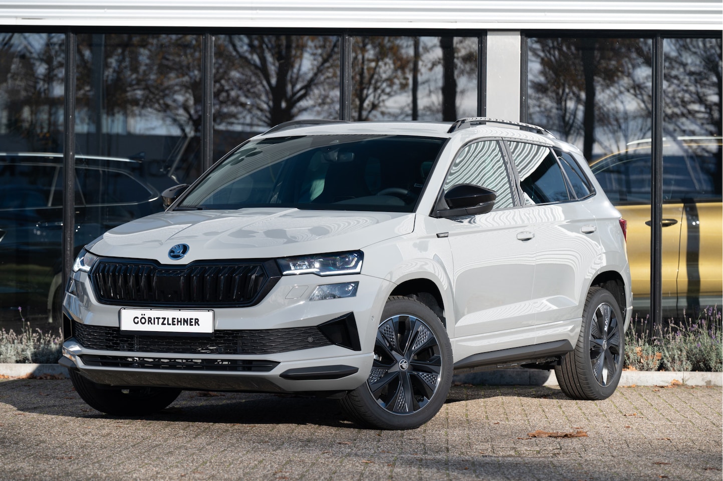 Skoda Karoq - 1.5 TSI 150pk DSG Sportline Business | Trekhaak | 5j. / 100.000km garantie | 360 camera | - AutoWereld.nl