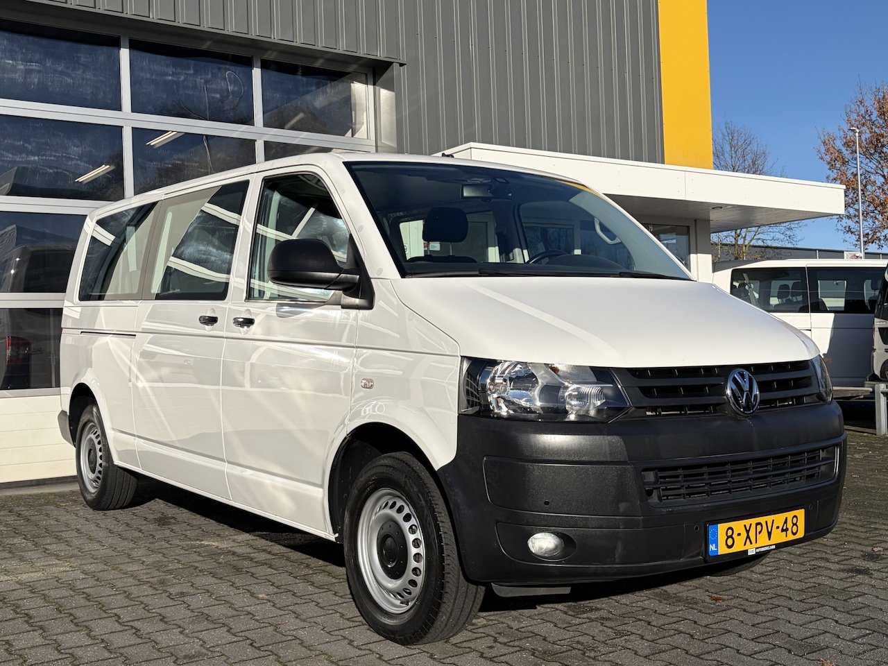 Volkswagen Transporter Kombi - 2.0 TDI L2H1 8-persoons BTW en BPM vrij Airco Cruise control Navigatie PDC 1e eigenaar Eur - AutoWereld.nl
