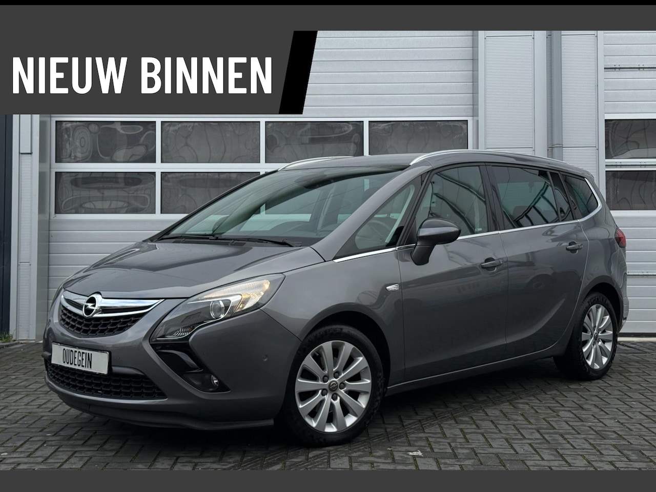 Opel Zafira Tourer - 1.4 Edition 7Persoons / Fietsendrager / Leder / Navi / Sfeerverlichting / Stoelverwarming - AutoWereld.nl