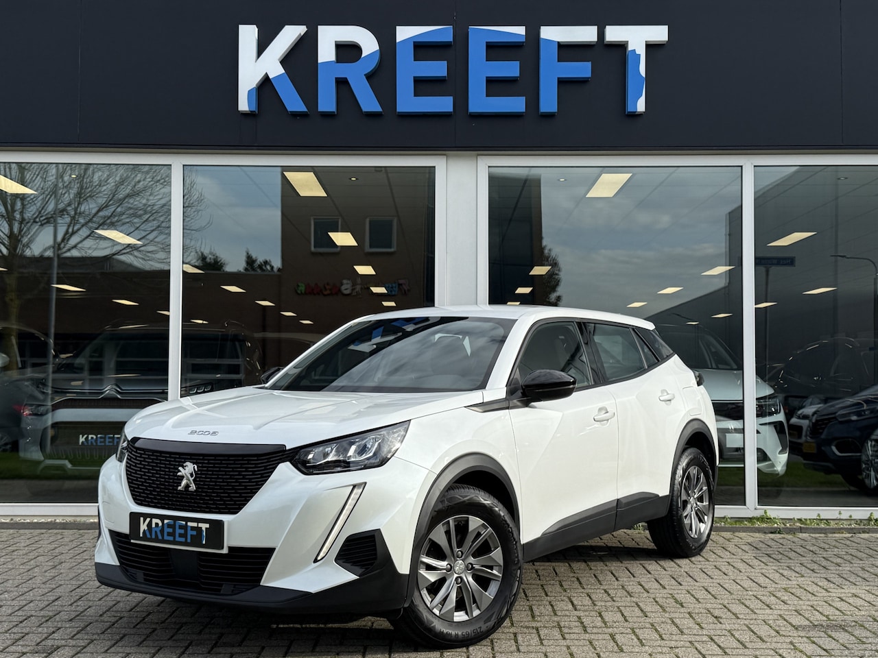 Peugeot 2008 - 1.2 PureTech Allure App connect | Cruise - AutoWereld.nl