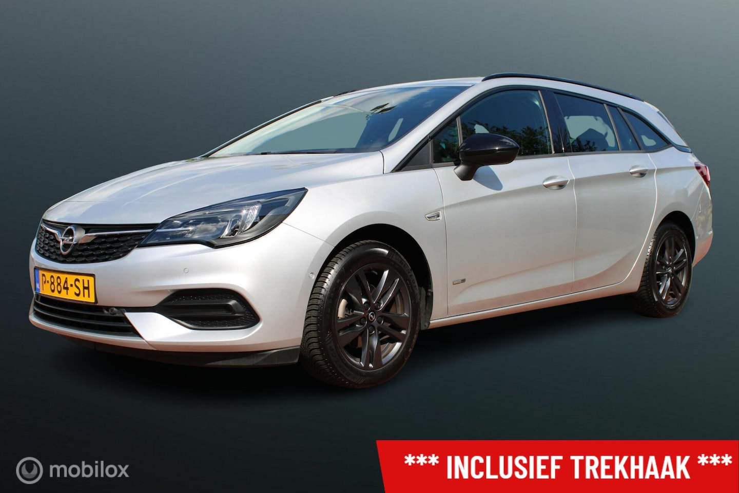 Opel Astra Sports Tourer - 1.2 Design & Tech 1.2 Design @ Tech, Pdc Voor + achter + camera, Trekhaak, Cruise, Clima, Navi, App connect, - AutoWereld.nl