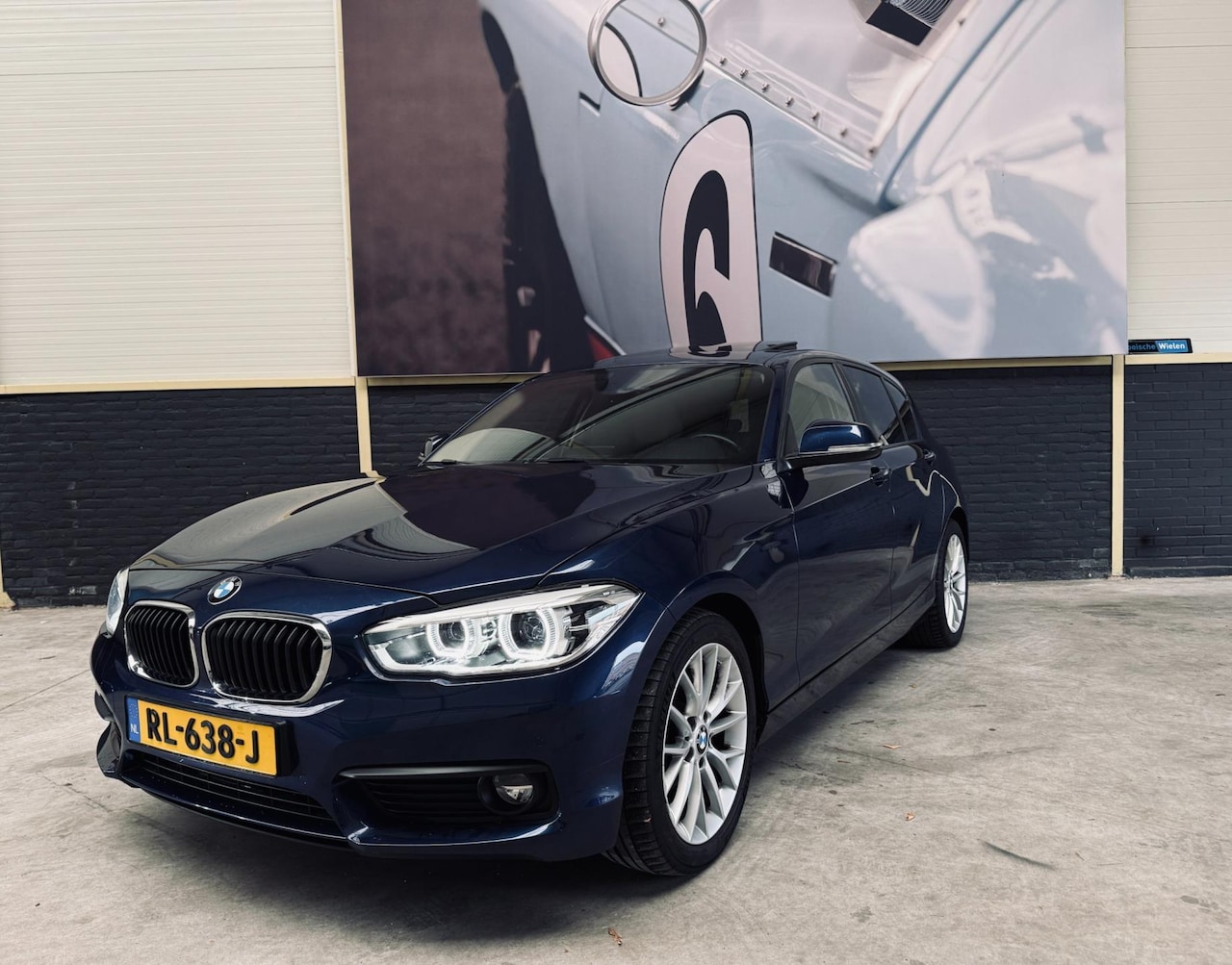 BMW 1-serie - 118i Automaat Sport|Sportleder|Opendak|LED|Navi Prof| - AutoWereld.nl