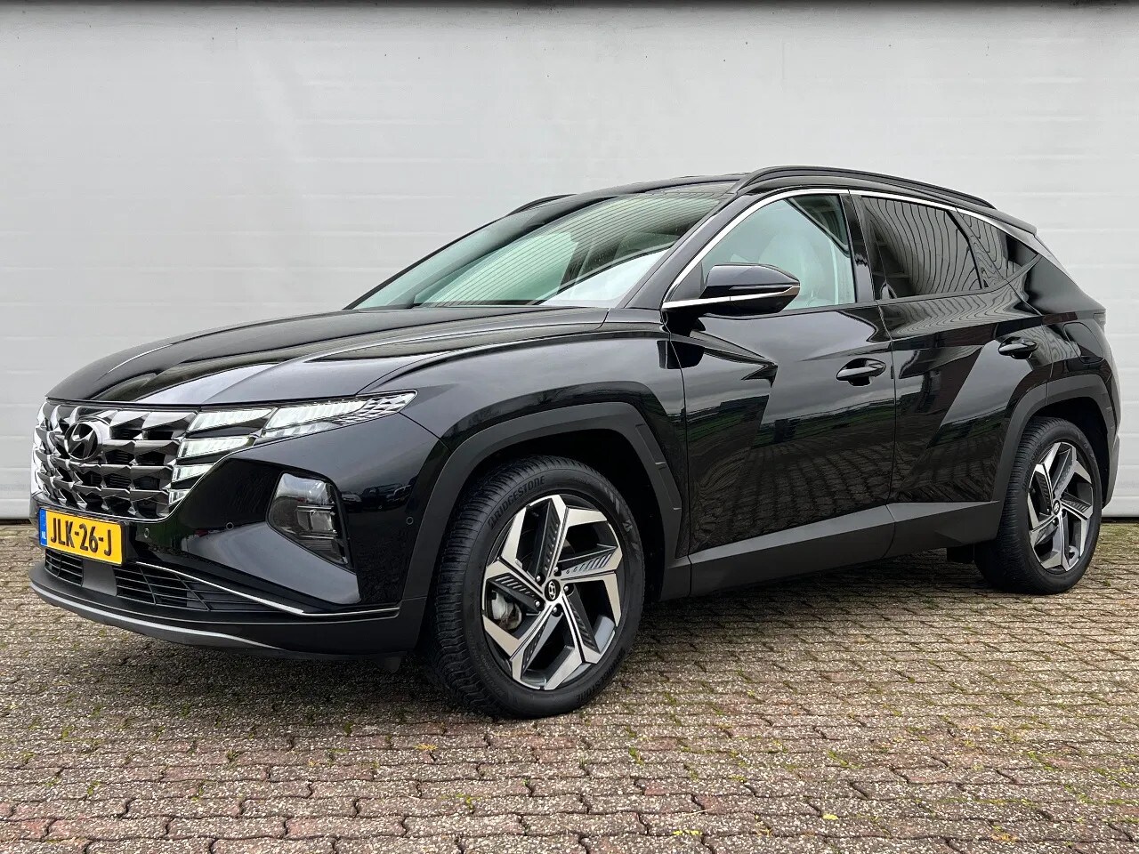 Hyundai Tucson - 1.6 T-GDI PHEV | Premium | 4WD | Beige leder | Trekhaak - AutoWereld.nl