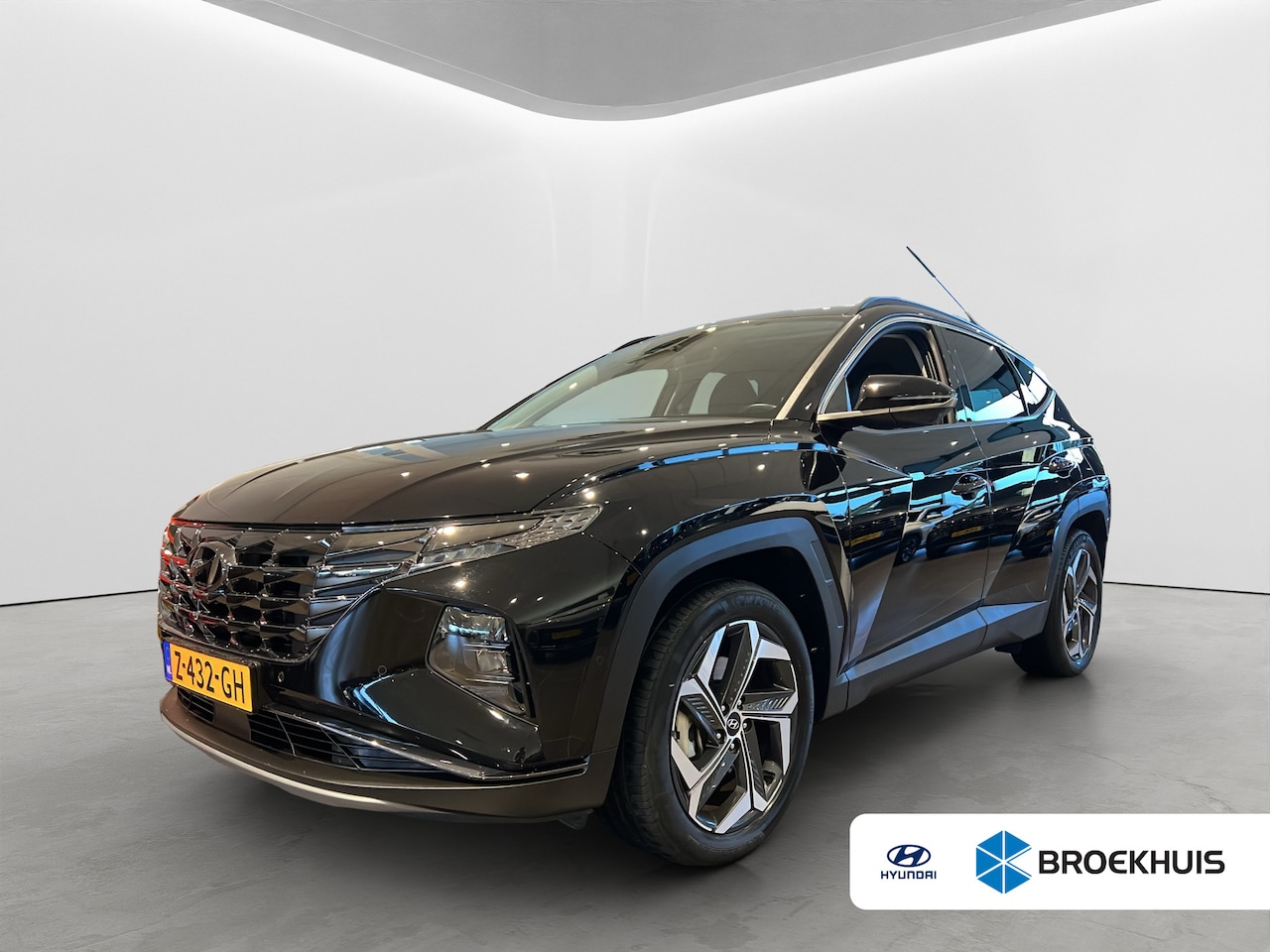 Hyundai Tucson - 1.6 T-GDI 265pk PHEV Premium 4WD (299,- p/m Demo Deal!) | Leder | Carplay | Climate | Keyl - AutoWereld.nl