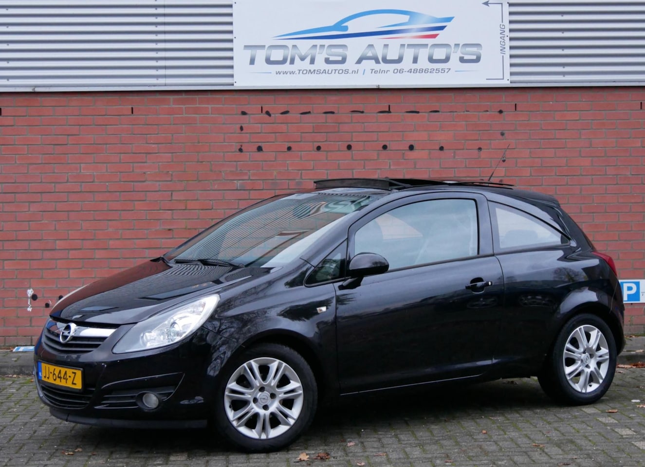 Opel Corsa - 1.2-16V Sport pano. airco. half leder - AutoWereld.nl