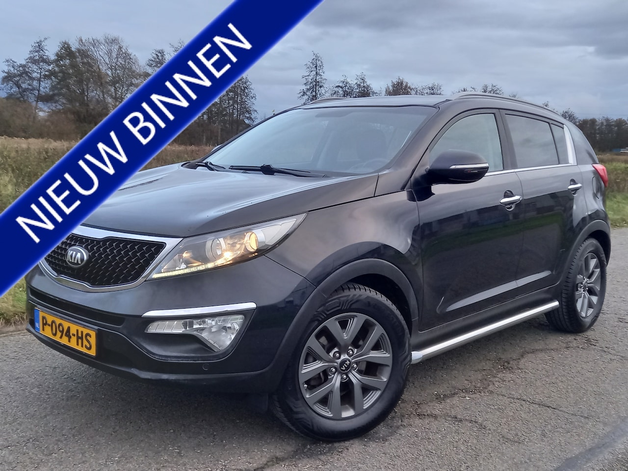 Kia Sportage - 1.6 GDI X-treme ComfortLine 1.6 GDI X-treme ComfortLine - AutoWereld.nl