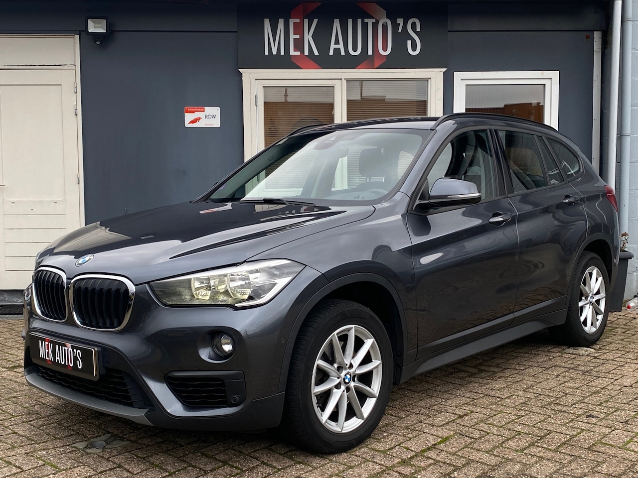 BMW X1 - SDrive18i Centennial Executive|Stoelverwarming|Navi| - AutoWereld.nl