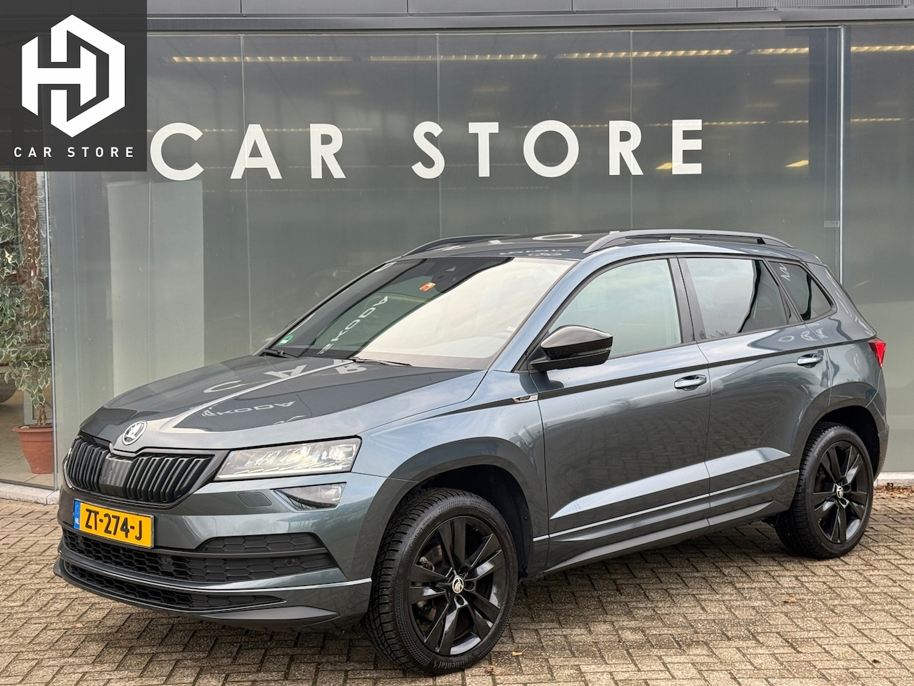 Skoda Karoq - 1.5 TSI DSG Sportline Pano|Sfeer|Canton|Dealer Onderhouden - AutoWereld.nl