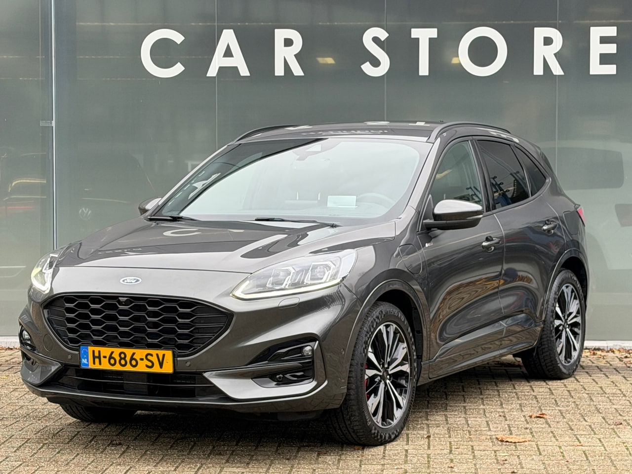 Ford Kuga - 2.5 PHEV ST-Line X TREKHAAK B&O Dealer onderhouden - AutoWereld.nl