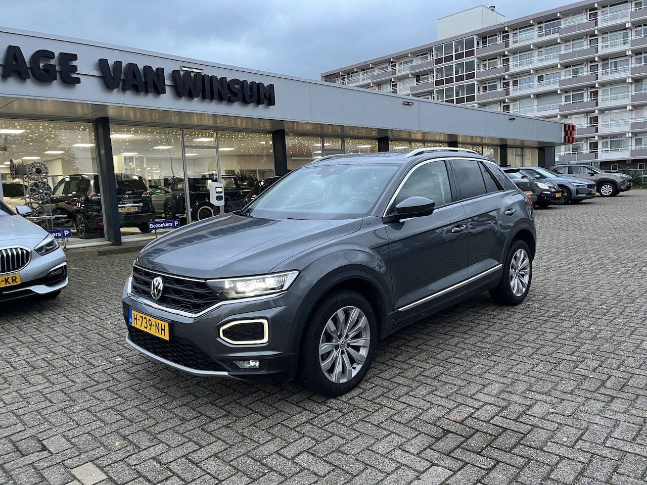 Volkswagen T-Roc - 1.5 TSI Sport Panodak Adcruise - AutoWereld.nl