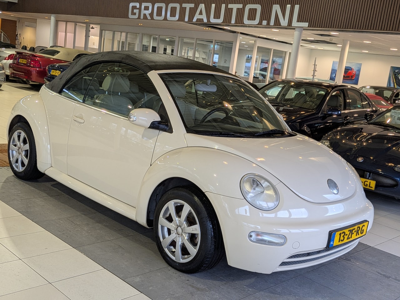 Volkswagen New Beetle Cabriolet - DAK DEFECT 1.4 Highline Airco, Lederen, Stuurbekrachtiging - AutoWereld.nl