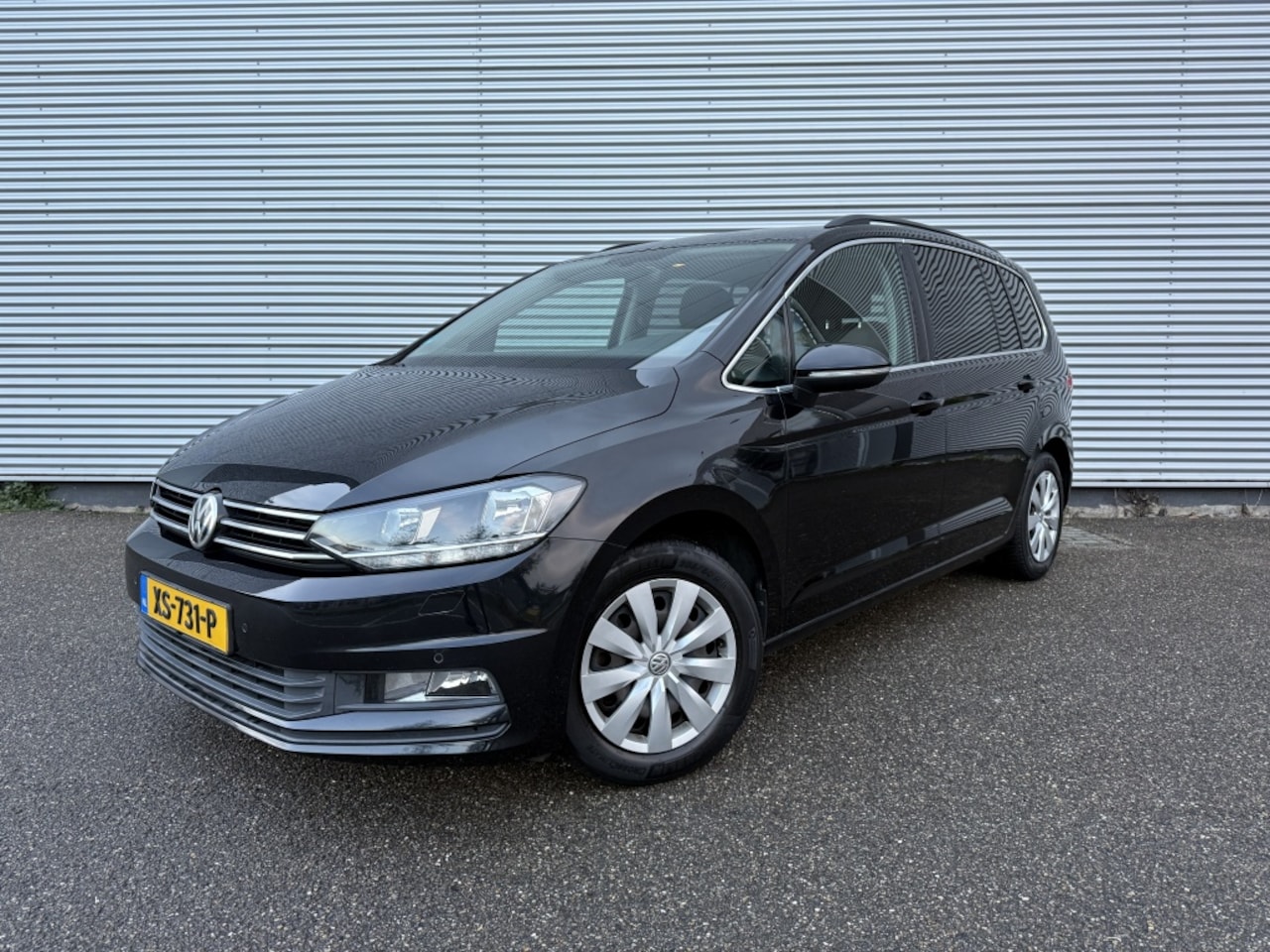 Volkswagen Touran - 1.4 TSI Con. Ser. 7p Automaat PDC Cruise Stoelverwarming nette s - AutoWereld.nl