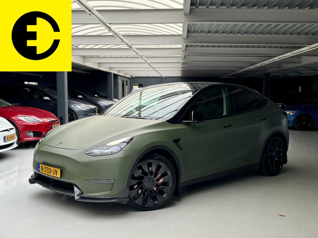 Tesla Model Y - Performance AWD 75 kWh | Mat groene wrap | Doorlopende achterlichten - AutoWereld.nl