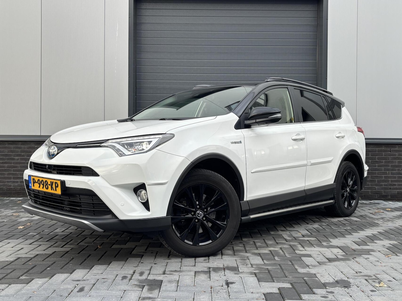 Toyota RAV4 - 2.5 Hybrid AWD Executive Bearlock / Leer / Pano - AutoWereld.nl