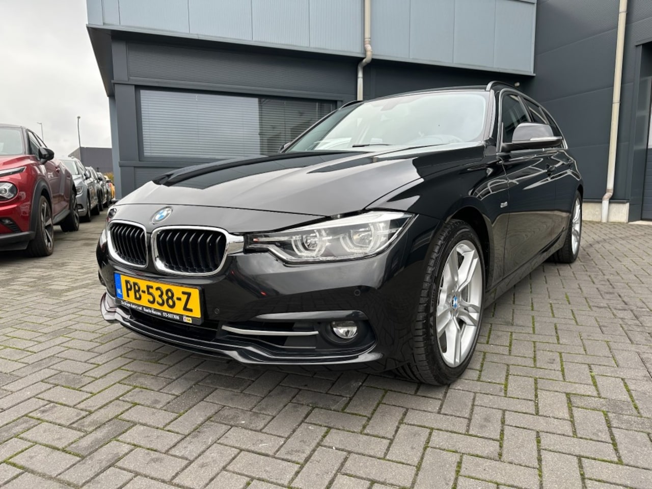 BMW 3-serie Touring - 320i Touring Aut. High Executive M-Sport Performance Trekhaak - AutoWereld.nl
