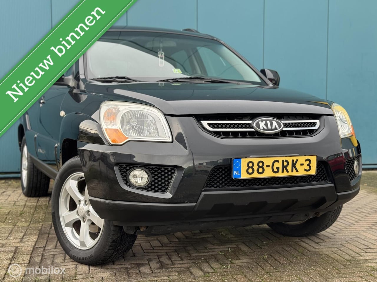 Kia Sportage - 2.0 CVVT X-tra Climate Control Cruise Control APK 26-08-2026 - AutoWereld.nl