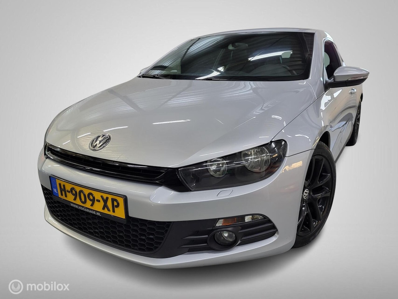 Volkswagen Scirocco - 1.4 TSI/Cruise/Clima/PDC/Stoelverwarming - AutoWereld.nl