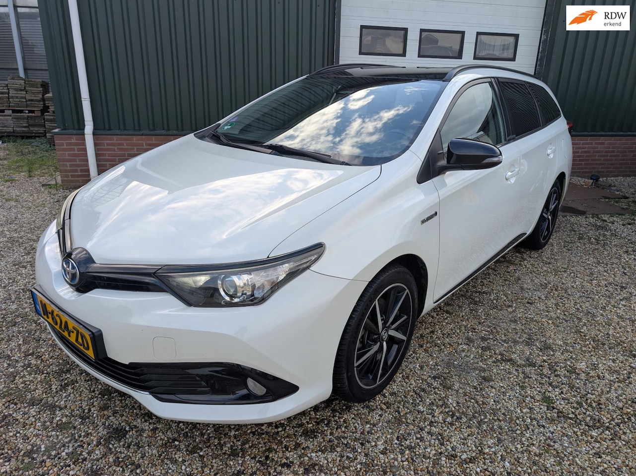 Toyota Auris Touring Sports - 1.8 Hybrid Dynamic camera navigatie - AutoWereld.nl